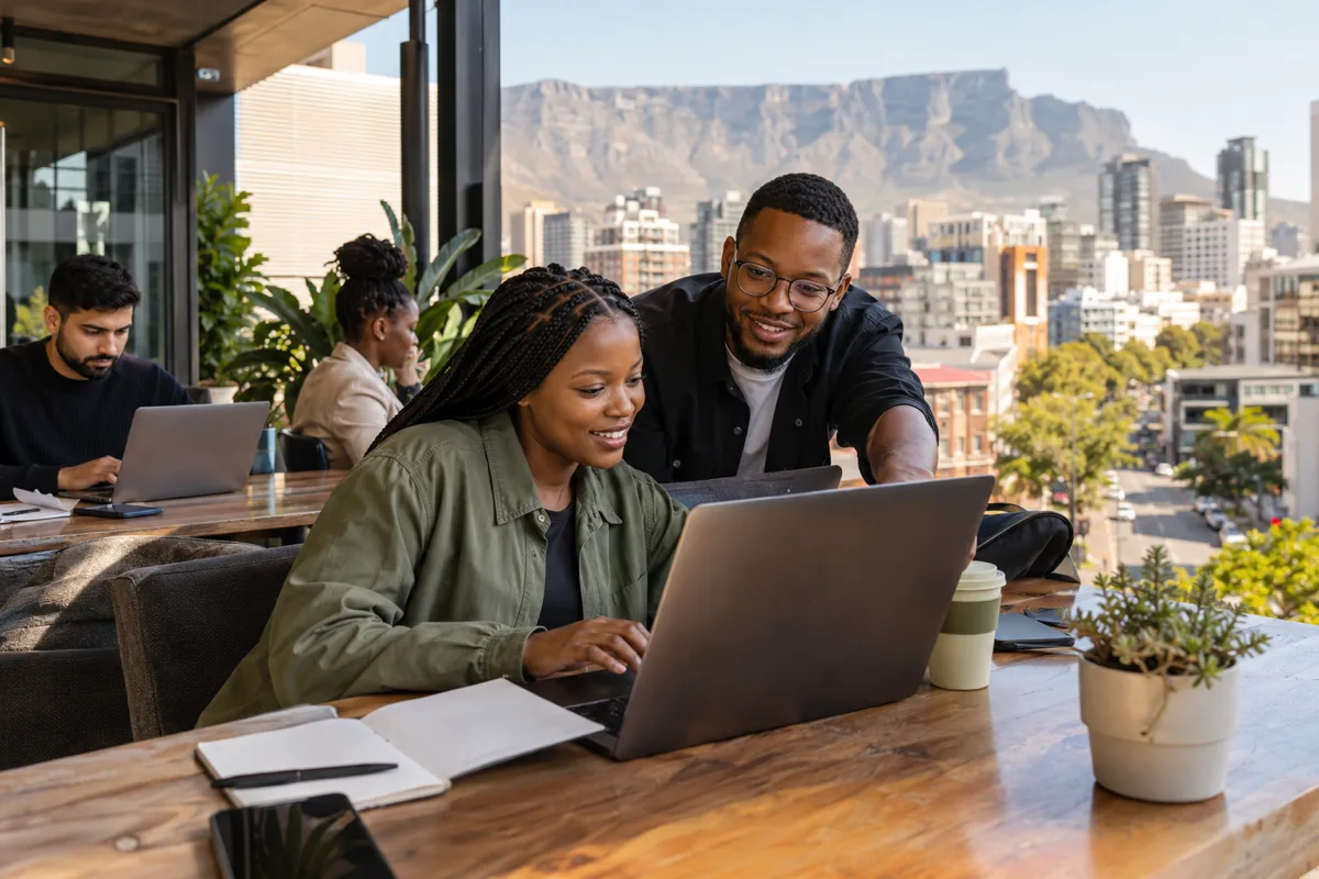 South African software applicant reviewing code and a career listing on a laptop